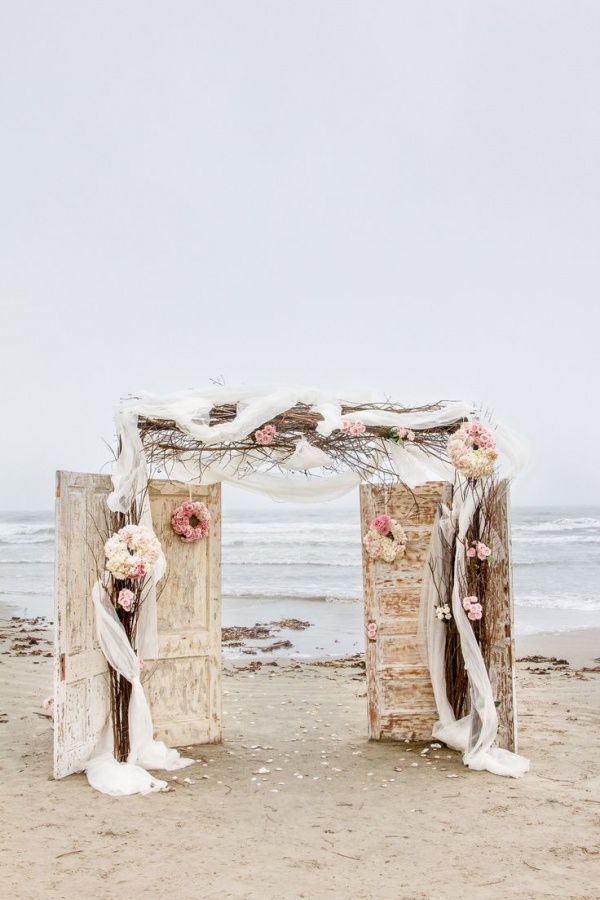 beach wedding ceremony backdrop with doors | Ceremony Backdrops Doors | photo: C Baron Photography