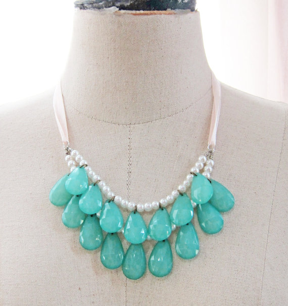 blue statement necklace (via How to Wear a Bib Necklace)