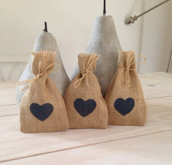 blue heart favor bags | 35 Easily Beautiful Ways to Use Burlap for Weddings https://emmalinebride.com/rustic/ways-use-burlap-weddings/