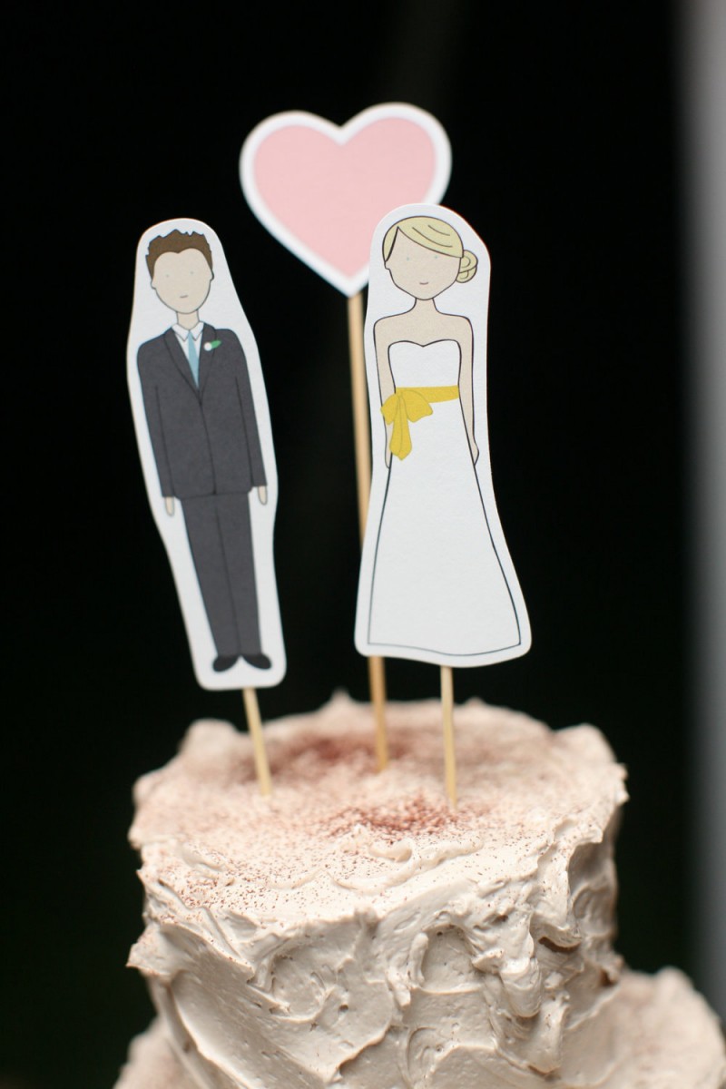 bride and groom cut out cake toppers