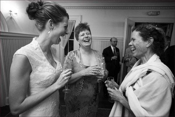 bride-laughs-with-guests - Liriodendron Mansion Wedding