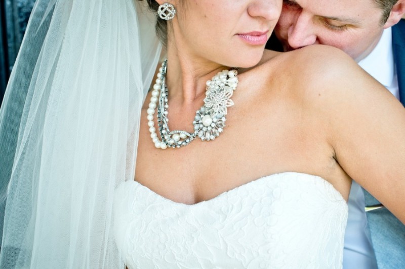 bride with statement necklace strapless gown