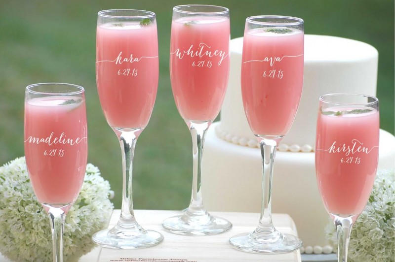 bridesmaid champagne flutes via personalized glassware gifts | https://emmalinebride.com/bridesmaids/personalized-glassware-gifts/