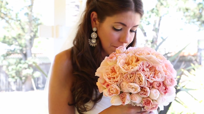 bride with bouquet for her Sova Gardens wedding film