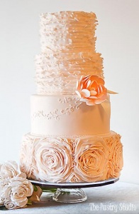 ruffly wedding cake with soft rosettes