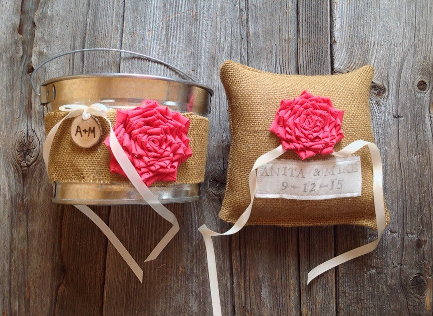 burlap wrapped flower pail and burlap ring pillow | 50 Best Burlap Wedding Ideas | via https://emmalinebride.com/decor/burlap-wedding-ideas/