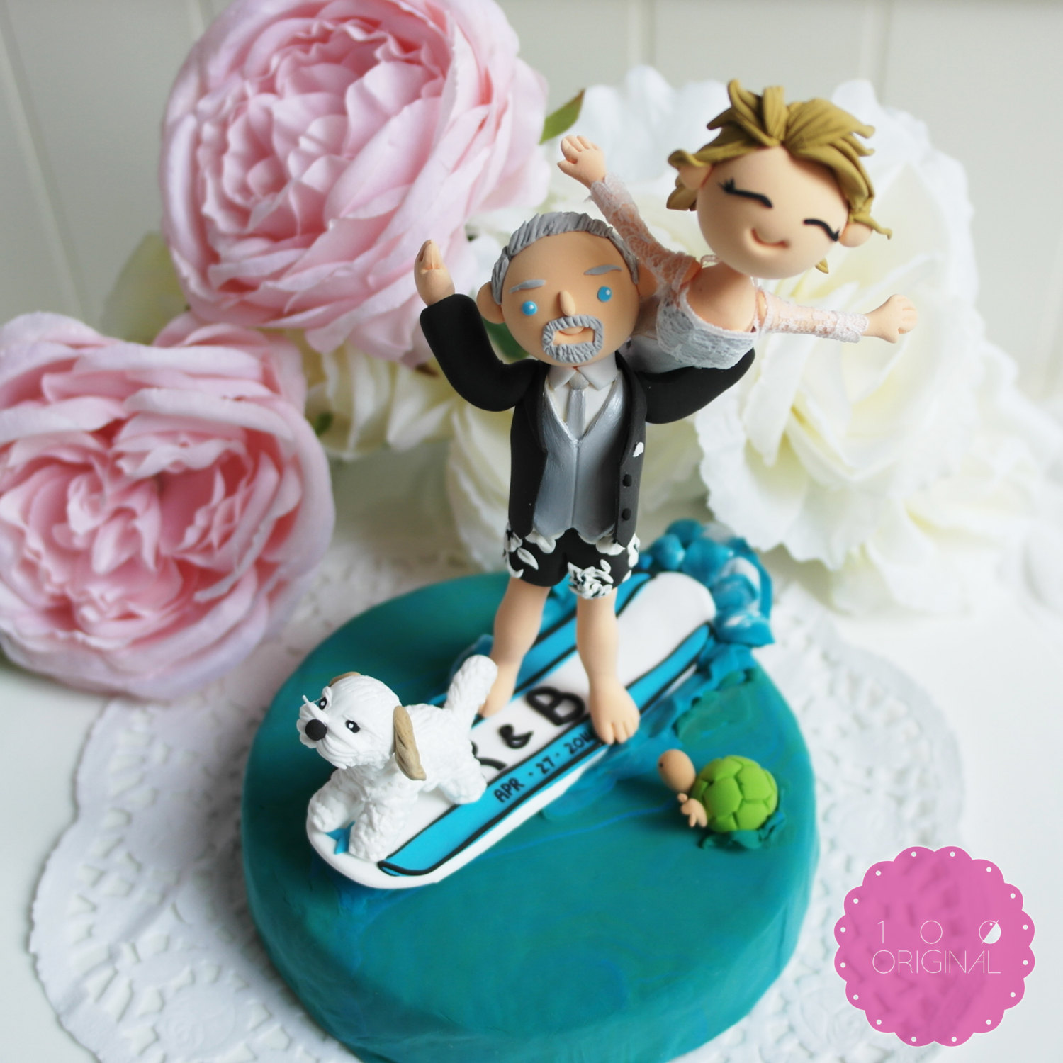 cake topper surfing bride and groom - 9 Adorable Custom Made Cake Toppers via https://emmalinebride.com/decor/custom-made-cake-toppers/