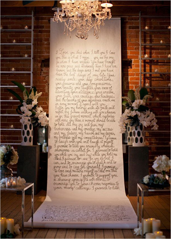 chandelier above ceremony space with handwritten scroll