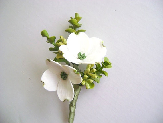 clay dogwood boutonniere for modern wedding | via What Kind of Boutonniere to Pick (and Why) https://emmalinebride.com/groom/what-kind-of-boutonniere/