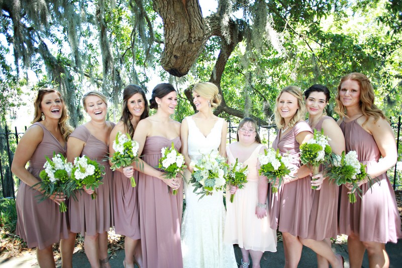 Bride with her bridesmaids, holding bouquets | Photographer: Melissa Prosser Photography | via https://emmalinebride.com/real-weddings/colleen-ryans-lovely-savannah-wedding-at-the-mansion-on-forsyth-park