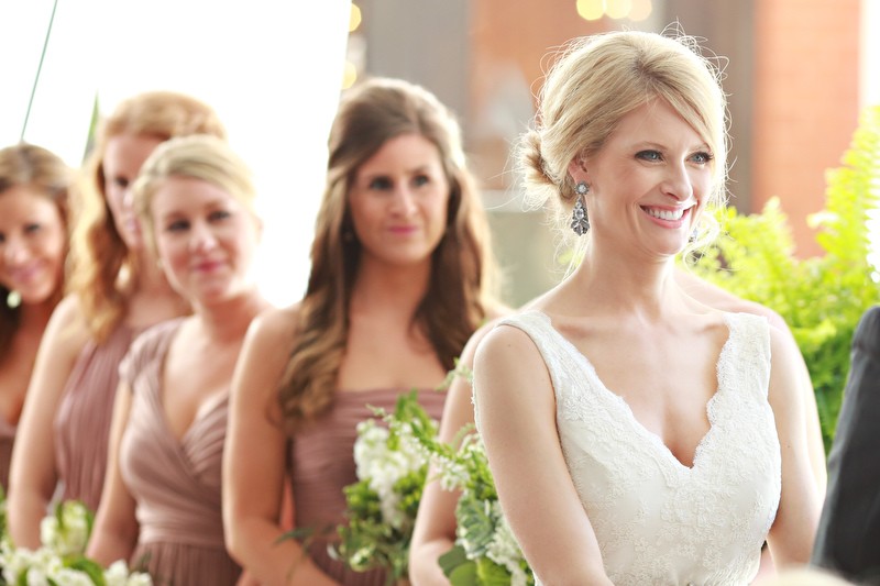 The bride and her bridesmaids at the ceremony | Photographer: Melissa Prosser Photography | via https://emmalinebride.com/real-weddings/colleen-ryans-lovely-savannah-wedding-at-the-mansion-on-forsyth-park