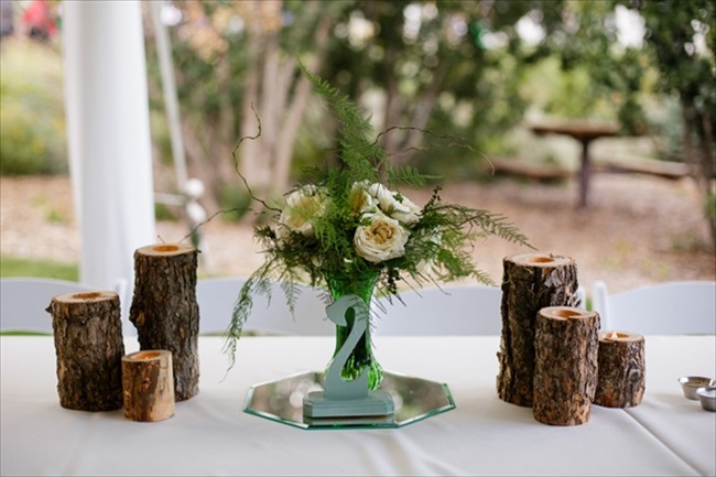 Rustic chic centerpiece idea | Photo: Searching for the Light Photography LLC | via https://emmalinebride.com/real-weddings/colorado-chic-wedding-kendall-brian/