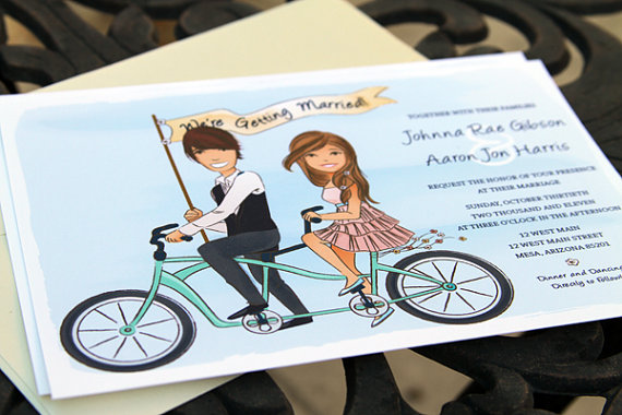 couple riding tandem bicycle smiling save the date // illustrated save the dates