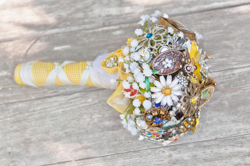 daisy brooch bouquet by hammer to lace | daisy ideas theme weddings
