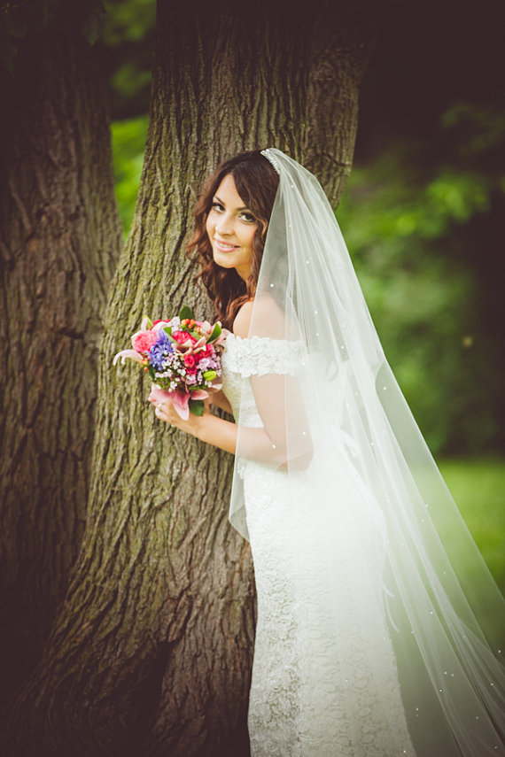 bride wearing long wedding veil