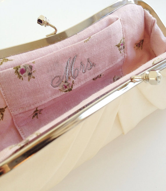 embroidered mrs label inside clutch purse