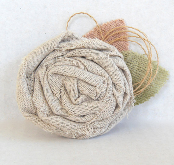 fabric flower pin | via What Kind of Boutonniere to Pick (and Why) https://emmalinebride.com/groom/what-kind-of-boutonniere/