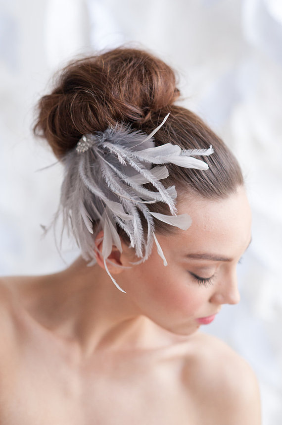 feather fascinator via 15 Stunning Wedding Veil Alternatives