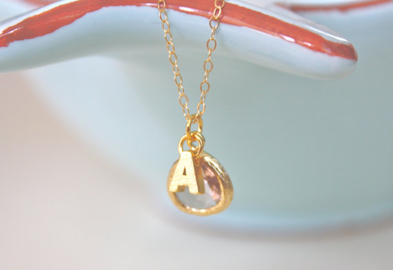 gold necklace with initial pendant | bridesmaid gift ideas https://emmalinebride.com/gifts/bridesmaid-gift-ideas/