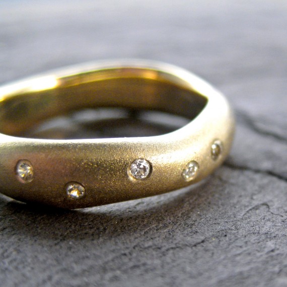 gold wedding ring with tiny round diamonds | handmade wedding bands | https://emmalinebride.com/jewelry/handmade-wedding-bands/