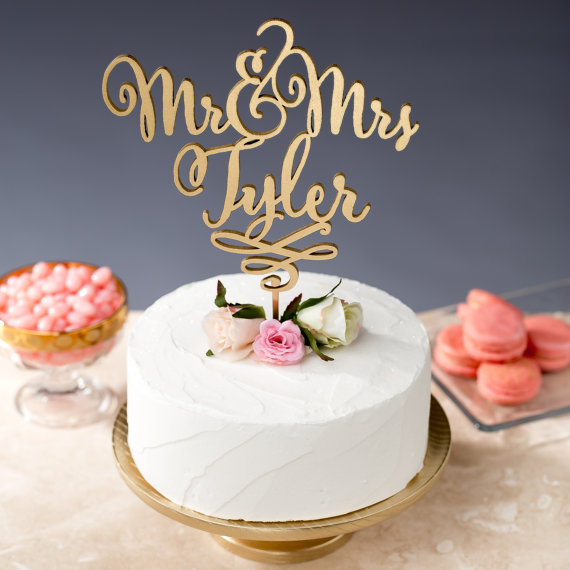 gold writing cake topper