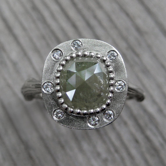 green cushion diamond ring via 27 Amazing Anniversary Gifts by Year
