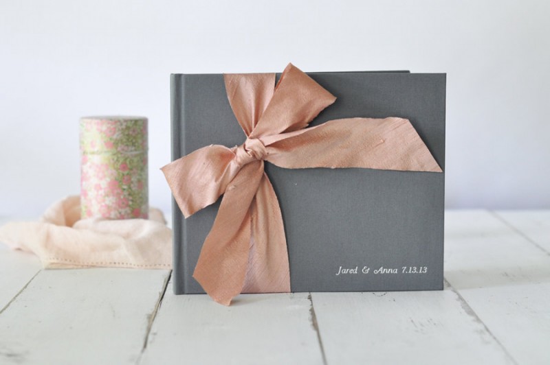 guest book with silk bow by claire magnolia