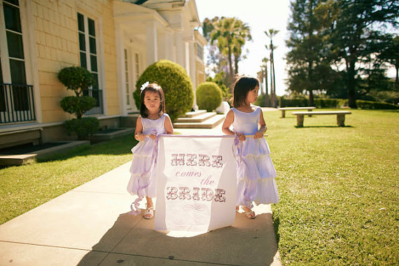 Here Comes the Bride Banner (by Fabulously Wed, photo by Desi Baytan) - What Does a Flower Girl Do? via EmmalineBride.com