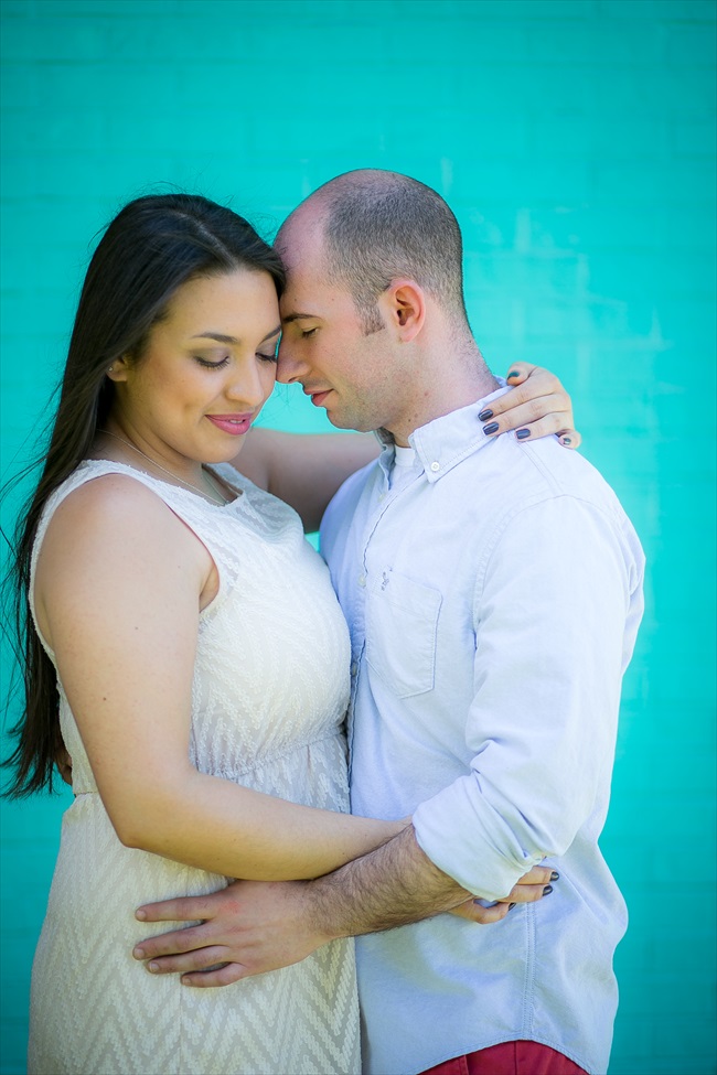 couple holds each other at their Fun Austin Engagement Session | Photographer: Adrianne Riley Photography | via https://emmalinebride.com/real-weddings/fun-austin-engagement-session-priscella-jerry/