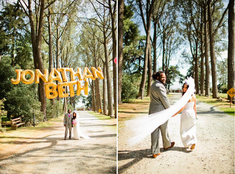 jonathan and beth giant gold balloons | photo: jacob mariano | 7 Fun Ways to Use Giant Letter Balloons at Weddings https://emmalinebride.com/decor/giant-letter-balloons-weddings/