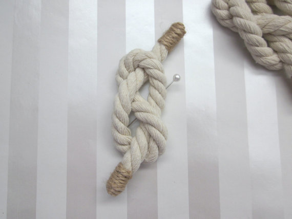 knotted rope boutonniere for nautical wedding | via What Kind of Boutonniere to Pick (and Why) https://emmalinebride.com/groom/what-kind-of-boutonniere/