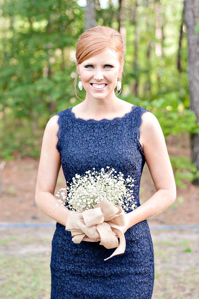 bridesmaid in navy lace dress with baby's breath bouquet, photo: just a dream photography | via https://emmalinebride.com/decor/navy-and-white-wedding-ideas/ | from 21 Navy and White Wedding Ideas