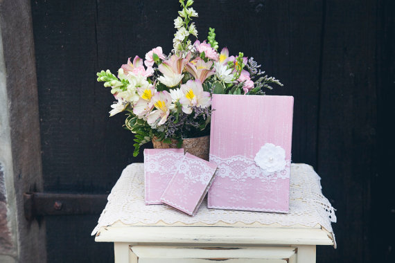 8 Fresh Rustic Wedding Decor Ideas - lace wrapped vow books (by PNZ Designs, photo: Melania Marta Photography)