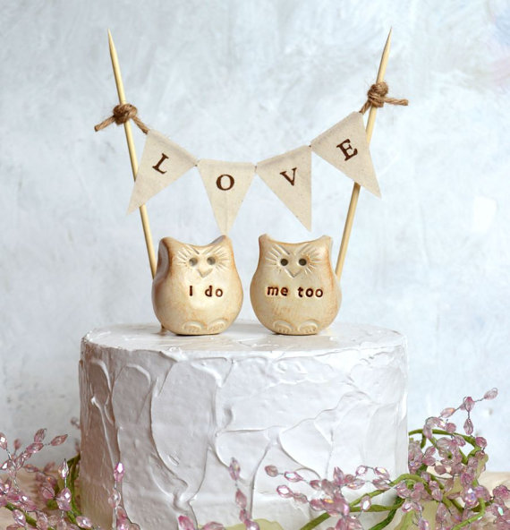 Handmade wedding cake topper featuring owls: 'I Do' and 'Me Too' with 'Love' cake banner.  By Skye Art.