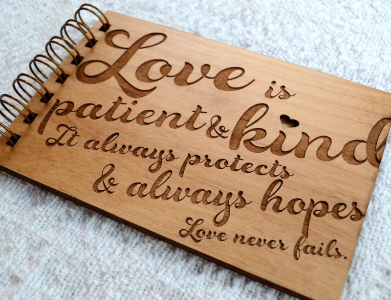 love never fails engraved wood guest book by figs and ginger