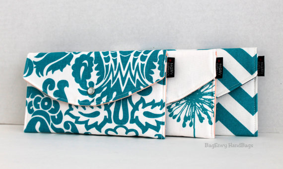 Modern Teal Mismatched Clutches - pick a purse each bridesmaid will love in a particular color with her own unique pattern or print.