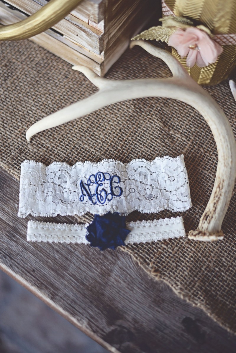 monogrammed wedding garter in blue stitching