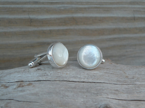 mother of pearl cufflinks via 27 Amazing Anniversary Gifts by Year