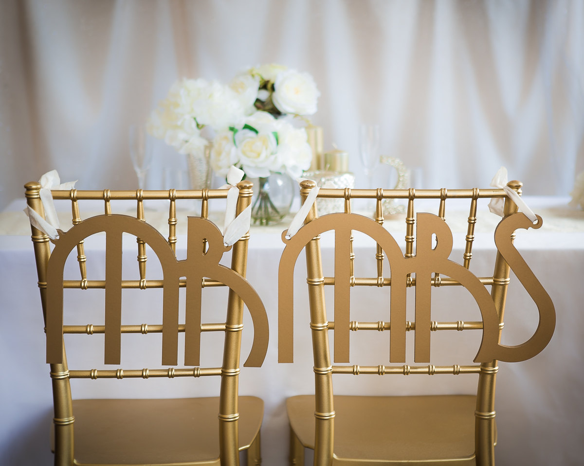 mr mrs gatsby chair signs | via bride and groom chair signs https://emmalinebride.com/decor/bride-and-groom-chairs/