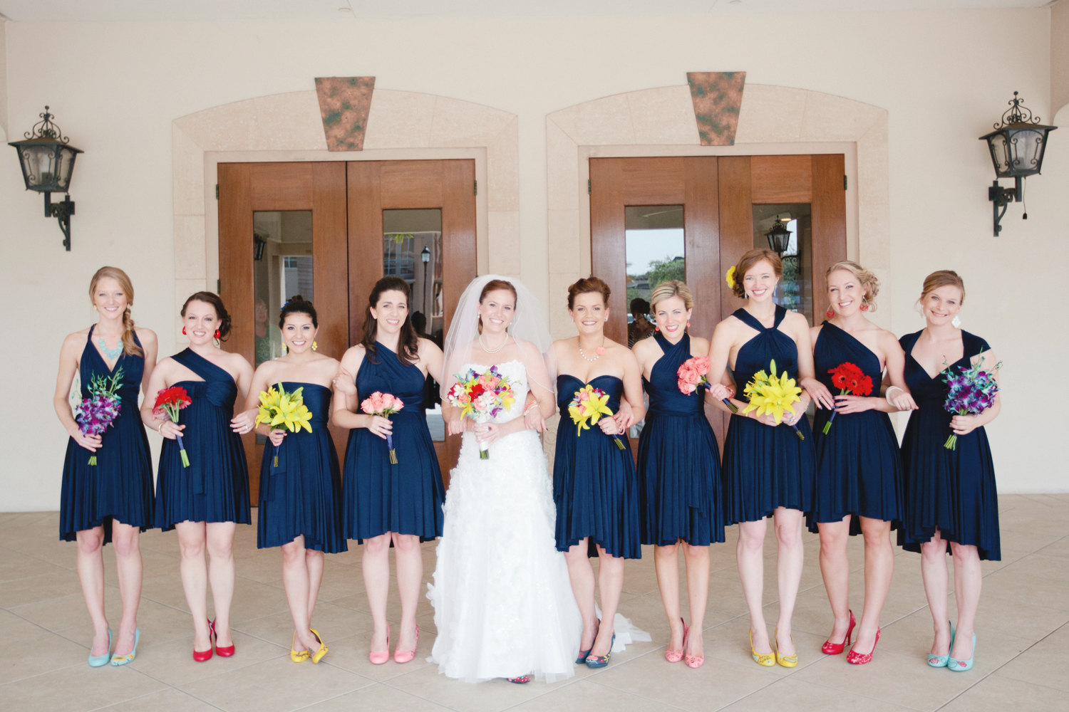 navy blue bridesmaid convertible dresses | via http://emmalinebride.com/bridesmaids/bridesmaid-dress-worn-different-ways/ | love the shoes!