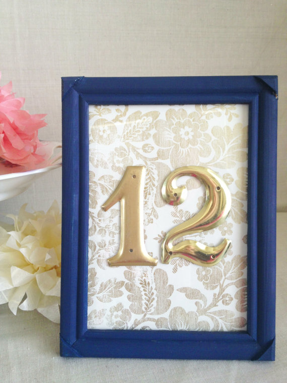 Gold Table Numbers with Navy Blue Frame (by River Kiss Weddings via Emmaline Bride)