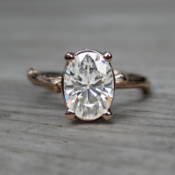 oval moissanite engagement ring (via 7 Alternative Engagement Ring Ideas)