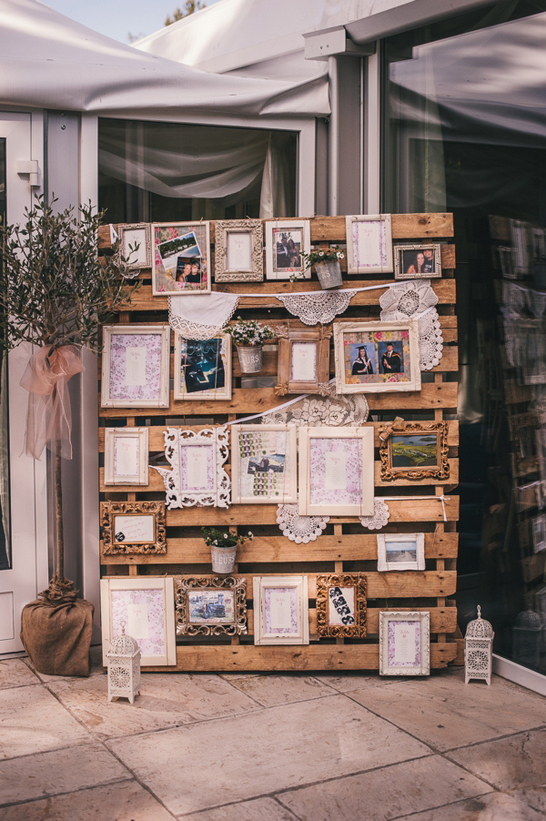 pallet decorated with vintage photo frames
