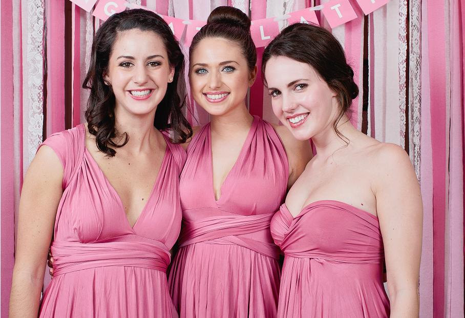 hot pink convertible bridesmaid dress | via https://emmalinebride.com/bridesmaids/bridesmaid-dress-worn-different-ways/