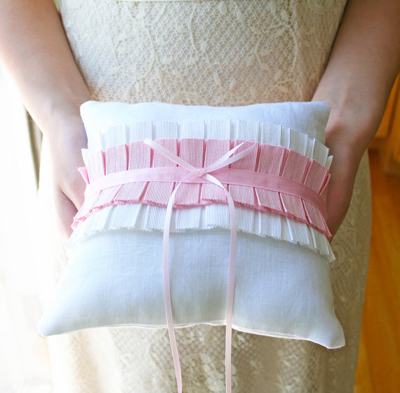 pink pleats ring pillow via 8 Chic Linen Ring Pillows