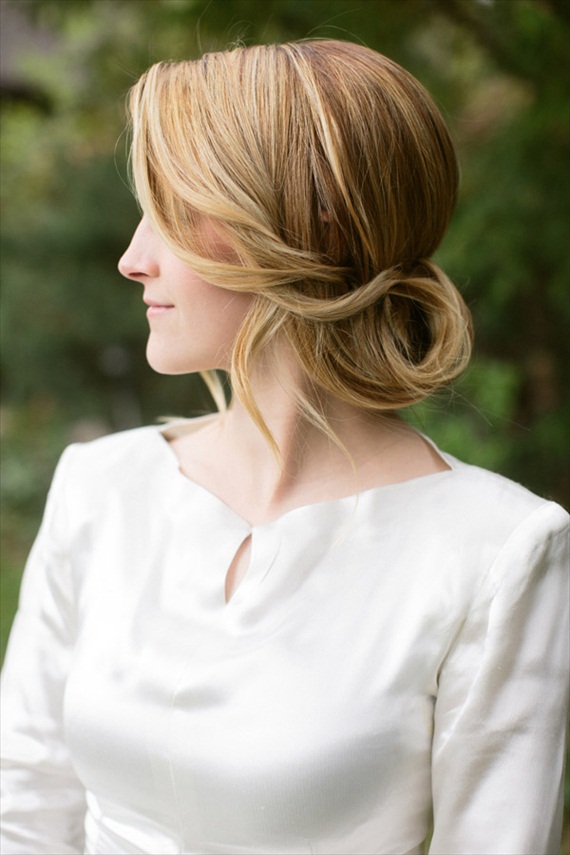 This ponytail flip updo, as shown from the side, is an elegant look for the bride or bridesmaid. By Hair and Makeup by Steph, photo by Ciara Richardson.