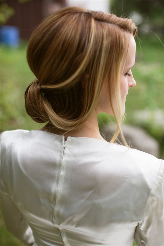 This ponytail flip updo is an elegant, pulled back hairstyle that is perfect for the bride.  We love wedding hairstyles that are unique, like this one! By Hair and Makeup by Steph, photo by Ciara Richardson.
