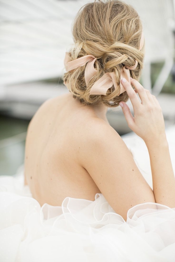 ribbon in bride's hair wedding hairstyle