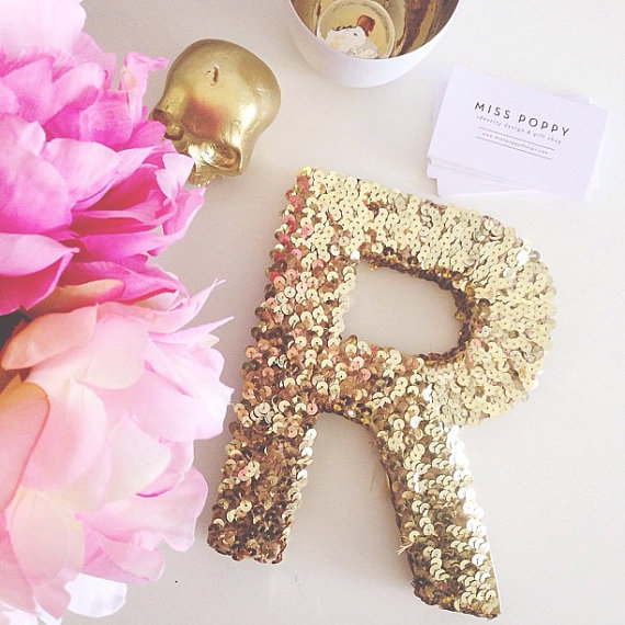 sequin letter in gold