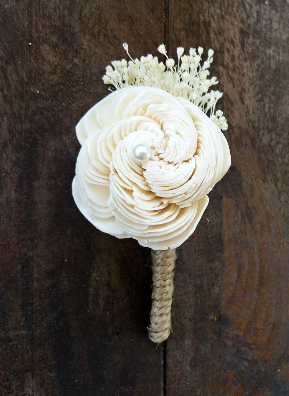 sola flower boutonniere wrapped in burlap